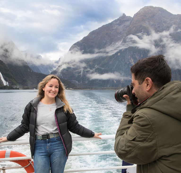 1-Day-Milford Sound - Couple-taking-photo